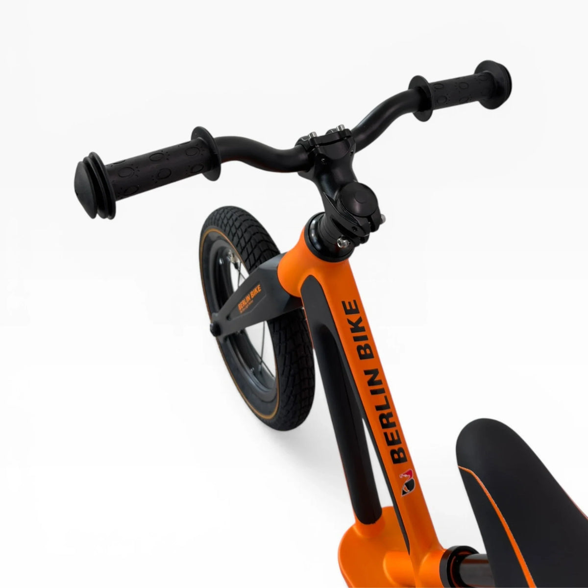 Berlin Bike Raddy Laffy Balance Bike 12 Inch handlebar detail orange